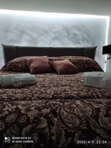 Postel nebo postele na pokoji v ubytování La Kasita di Giulia