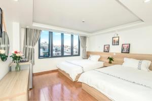 Postel nebo postele na pokoji v ubytování Hotel Pansy