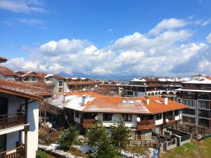 a view of a city with houses and buildings at Edelweiss Inn Aparthotel, Apartment 32 in Bansko