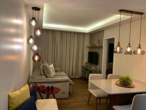 Khu vực ghế ngồi tại Maravilhoso apartamento 2 quartos com ofurô Porto da Barra Salvador Summer Barra Flat