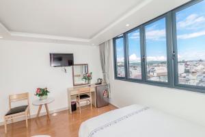 TV a/nebo společenská místnost v ubytování Hotel Pansy