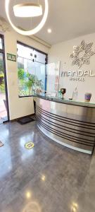 a lobby with a reception counter in a store at Mandala in Pisco