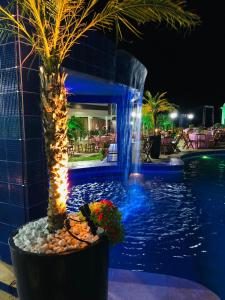 Kolam renang di atau dekat dengan Balneário Caratininga