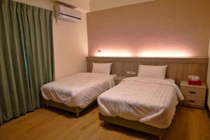Katil atau katil-katil dalam bilik di Bihaiju B&B +3 gambar