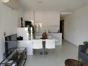 TV a/nebo společenská místnost v ubytování Apartamento Albimar