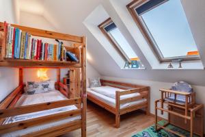 Postel nebo postele na pokoji v ubytování Ferienwohnung Nr 5 am Weststrand - 4 Sterne DTV