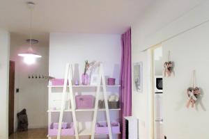Posteľ alebo postele v izbe v ubytovaní Purple House - Arboriamar Platamona
