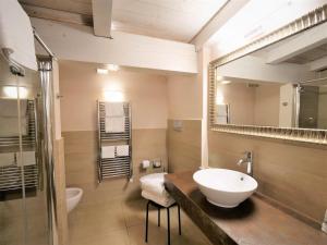 Koupelna v ubytování Hotel Patavium + 37 fotografií