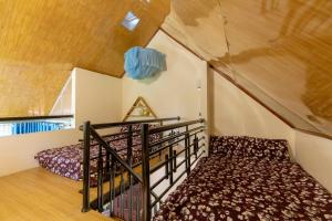 Postel nebo postele na pokoji v ubytování Homestay Vườn Tùng