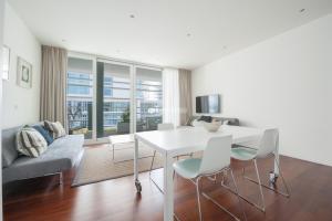 A television and/or entertainment centre at Jesolo Lido Village Immobiliare Pacella