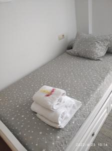 Posteľ alebo postele v izbe v ubytovaní apartamento melide