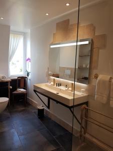 Et badeværelse på Le Manoir des Impressionnistes - Bord de Mer