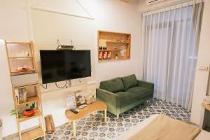 Televisor o centre d'entreteniment de South Gate Home Stay