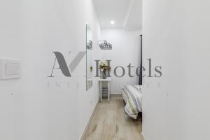 Postel nebo postele na pokoji v ubytování AYZ Silvela - Auto check-in property