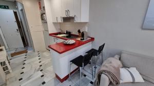 Kuchyňa alebo kuchynka v ubytovaní Super Holiday Lubina Sol Mijas Beachfront