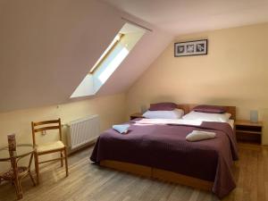 Postel nebo postele na pokoji v ubytování Hotel STARÝ PIVOVAR