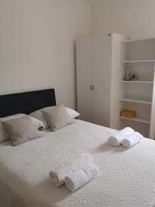 Postel nebo postele na pokoji v ubytování Apartments Tanja