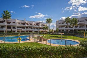 Bazén v ubytovaní Apartment Aguacate alebo v jeho blízkosti