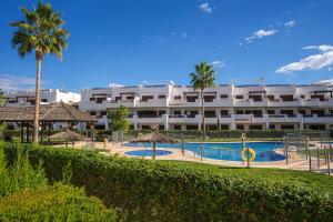 Bazén v ubytovaní Apartment Aguacate alebo v jeho blízkosti