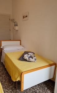 Llit o llits en una habitació de Hotel Marconi Miramare