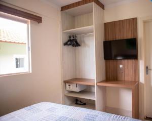 מיטה או מיטות בחדר ב-LACQUA DI ROMA HOTEL