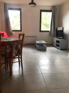 En sittgrupp på Appartement T2 tout confort tout équipé Jausiers