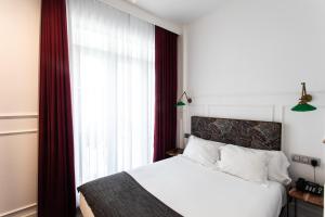 
Cama o camas de una habitación en Hotel Trueba
