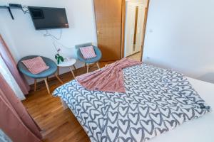 Posteľ alebo postele v izbe v ubytovaní Apartment Gobac