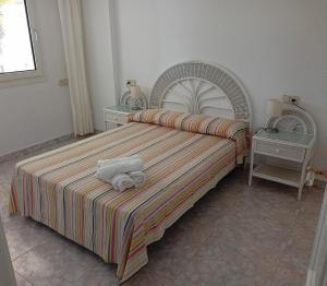 Ένα ή περισσότερα κρεβάτια σε δωμάτιο στο Casablanca - Playa Romana1 +21 φωτογραφίες