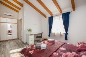 Postel nebo postele na pokoji v ubytování Holiday Home Fradelani
