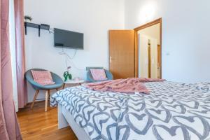 Posteľ alebo postele v izbe v ubytovaní Apartment Gobac