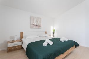 Posteľ alebo postele v izbe v ubytovaní Kuća za odmor Cvita