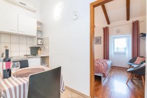 Kuchyňa alebo kuchynka v ubytovaní Apartment Gobac