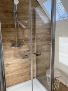 Ein Badezimmer in der Unterkunft SEA Office - Modernes Ferienhaus mit tollem Seeblick