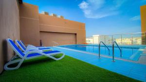 Bazén v ubytování Muscat Plaza Hotel nebo v jeho okolí