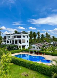 a view of the resort from the garden at Catsen Bungalows & Pool Phan Thiet in Phan Thiet