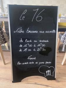 a chalkboard sign for a wedding on a table at Mercure Annecy Sud in Annecy