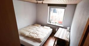 Postel nebo postele na pokoji v ubytování OJ Home