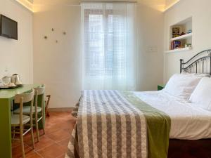 A bed or beds in a room at B&B San Francesco