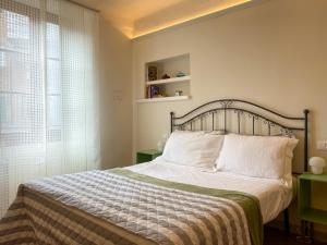 A bed or beds in a room at B&B San Francesco