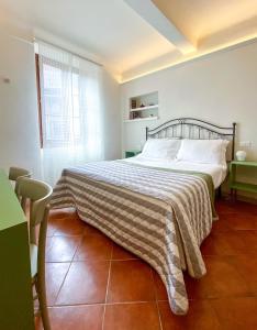 Llit o llits en una habitació de B&B San Francesco