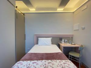 A bed or beds in a room at B&B San Francesco