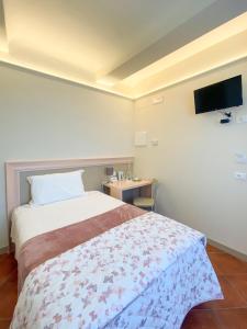 A bed or beds in a room at B&B San Francesco