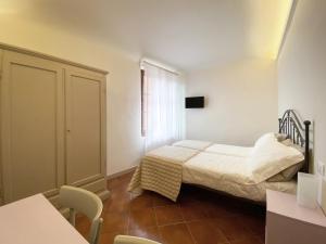 A bed or beds in a room at B&B San Francesco