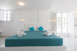 Un pat sau paturi într-o cameră la Sfiga villas