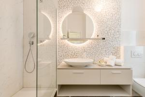 a bathroom with a sink and a shower at Luxury Rooms L'Avenue 2 Split in Split +37 photos