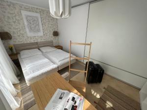 Posteľ alebo postele v izbe v ubytovaní Apartament Przy Plaży BOHO Świnoujście