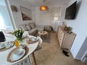 Posedenie v ubytovaní Apartament Przy Plaży BOHO Świnoujście
