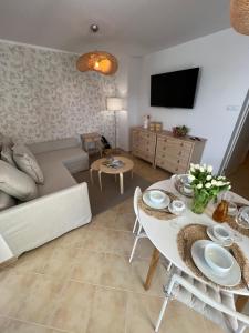 Posedenie v ubytovaní Apartament Przy Plaży BOHO Świnoujście