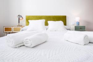 Posteľ alebo postele v izbe v ubytovaní FTV Holidays Homes